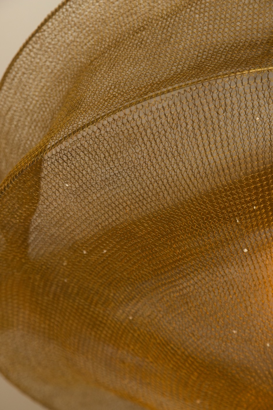 Textura dorada de lámpara tejida
